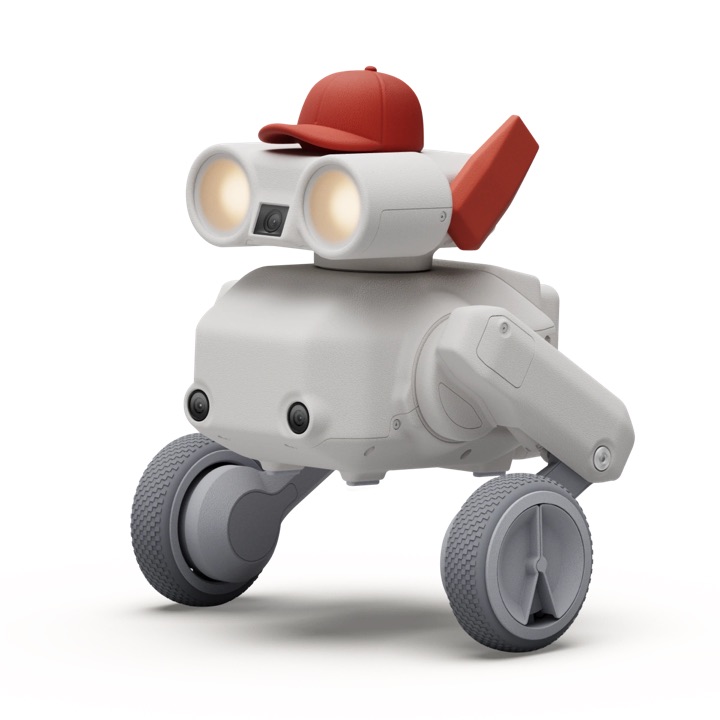 Front three-quarter studio render of Beni, a white three-wheeled robot with binocular-style glowing eyes, a chest camera, red ear fins, and a red baseball cap.