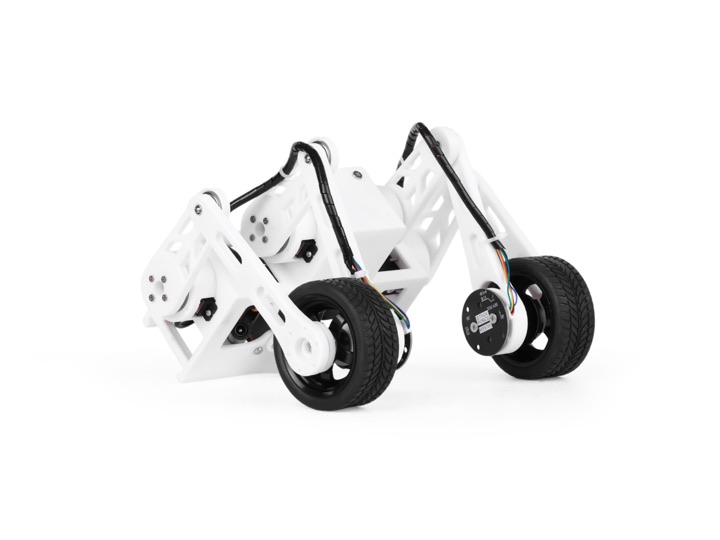 StackForce Mini wheeled-legged robot: a white 3D-printed skeletal frame on two articulated legs ending in fat black rubber wheels.