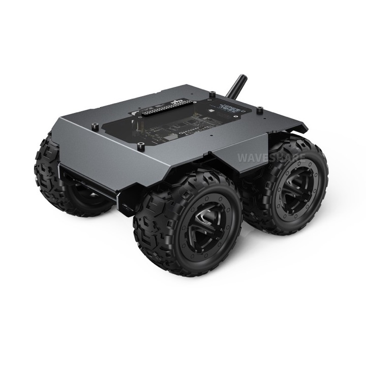 Waveshare WAVE ROVER four-wheel-drive chassis: grey aluminium body with an exposed ESP32 driver board and stub antenna on top, on four chunky black off-road tyres.